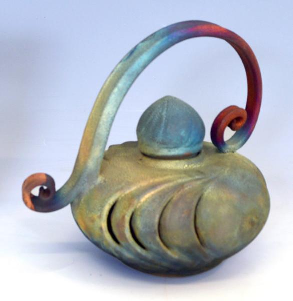 Raku Vase with lid and handle.