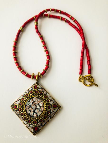 Handcrafted with Red Coral, Brass, Tibetan Pendant/Red Howlite Tube Beads