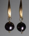 PEACOCK CULTURED ROUND PEARL ON LONG GOLD