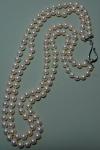 2 STRANDS OF CULTURED WHITE PEARLS