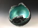 Turquoise and Black Glowing Stone