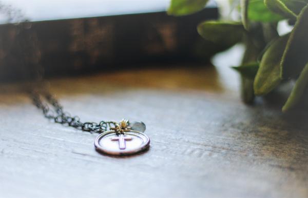 Sterling silver stamped cross on pearl picture