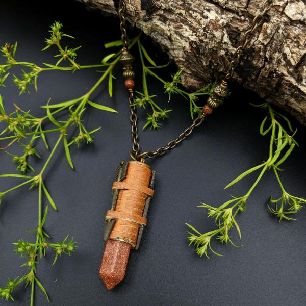 bullet casing necklace with deerskin leather and goldstone picture