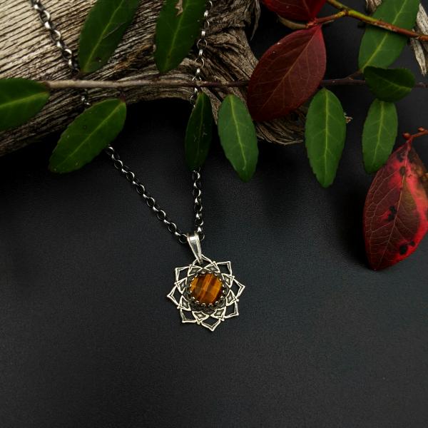 simple sterling silver flower mandala necklace with tiger eye