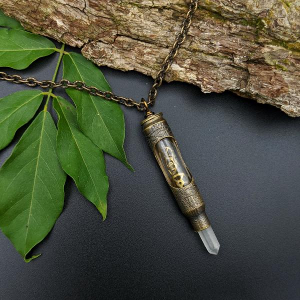 one of a kind etched bullet necklace with recycled watch gears picture