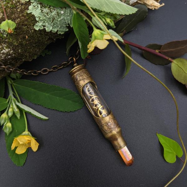 one of a kind etched bullet necklace with recycled watch gears