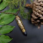 one of a kind etched bullet necklace with dried flowers