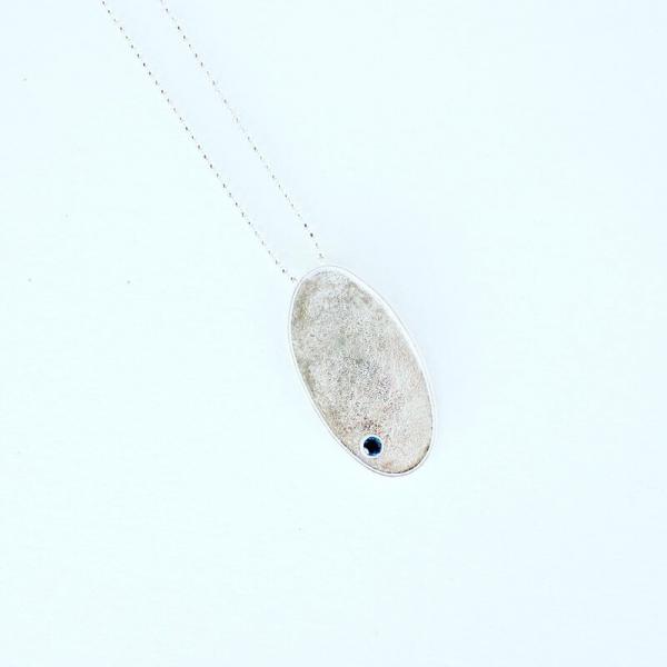 Sterling Silver Oval Pendant with Blue Topaz
