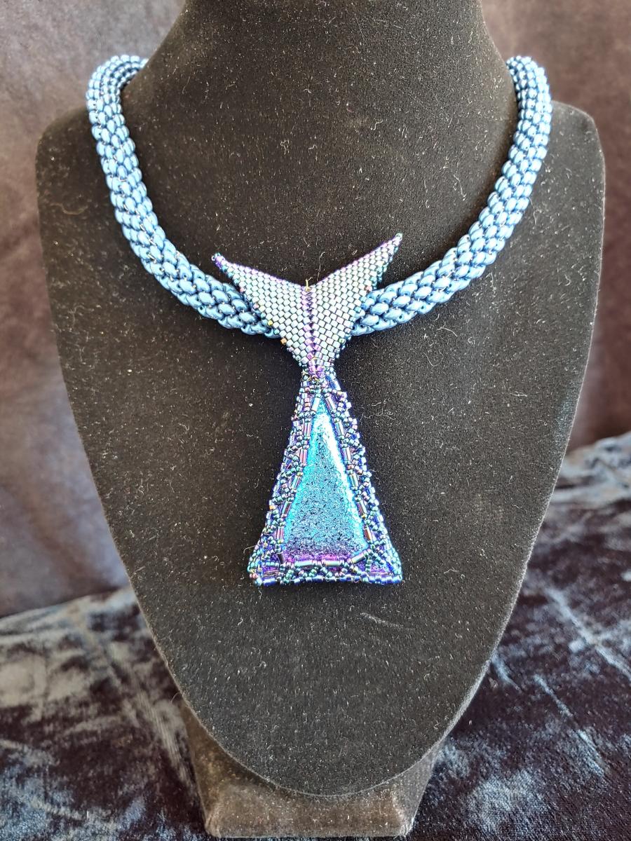 Dichroic pendant with beaded rope. picture