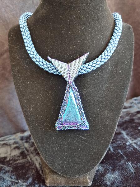 Dichroic pendant with beaded rope. picture