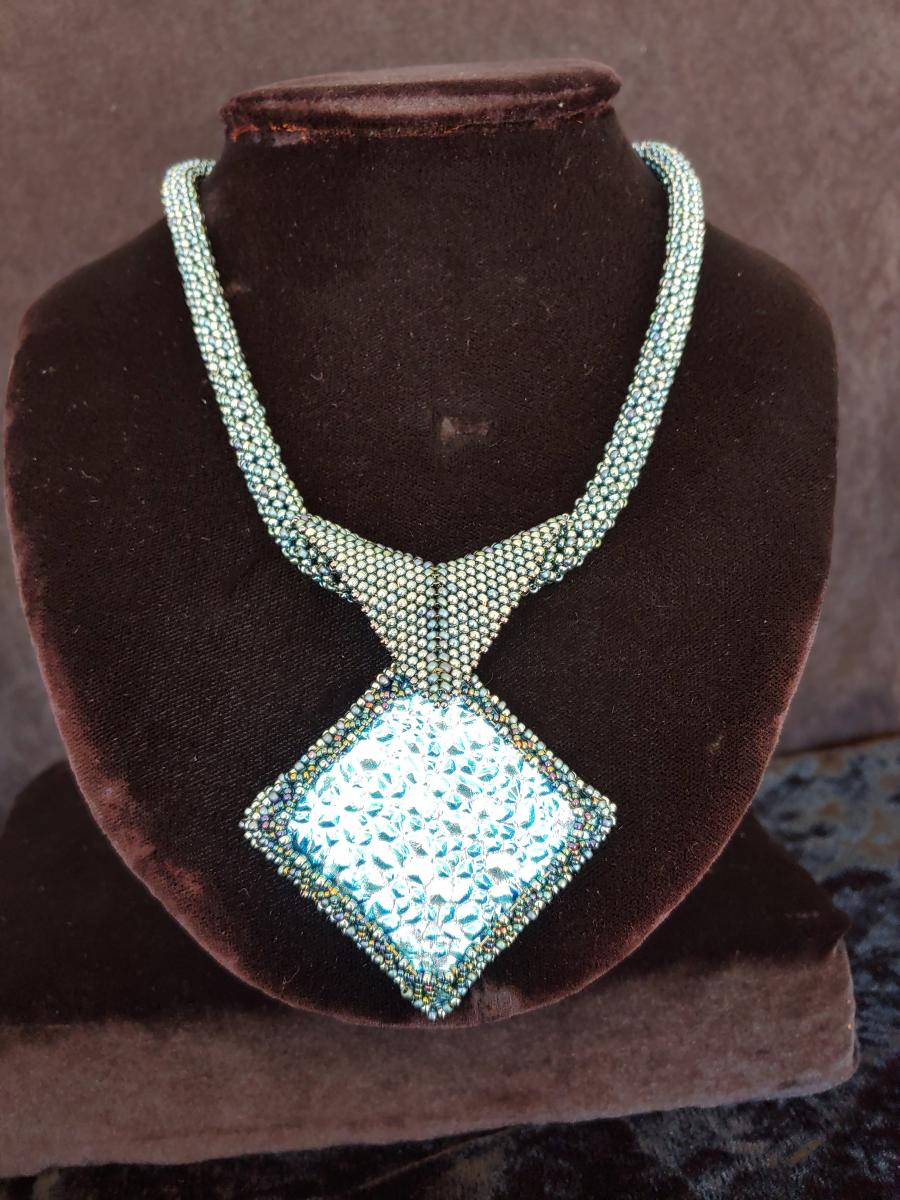 Fused dichroic glass with beading picture