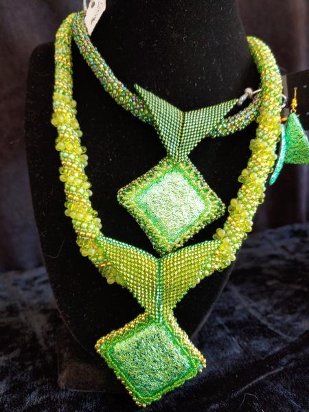 Dichroic pendant with beaded rope. picture