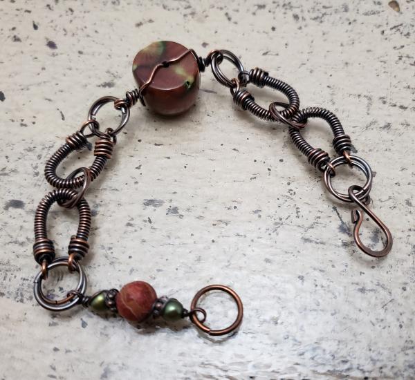 Bracelet Handmade copper coiled links, Petrefided Coral focal.