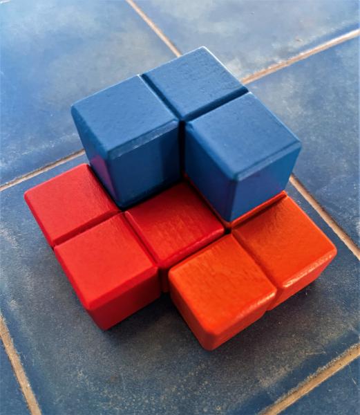 Soma Cube - Make 7 Soma  figures out of individual wooden cubes and then put together different structures starting with a cube. picture