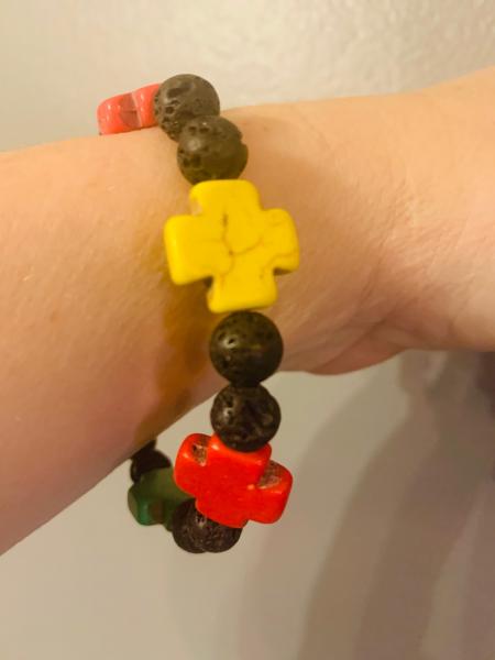 Multicolored Beaded Stretch bracelet with small crosses picture