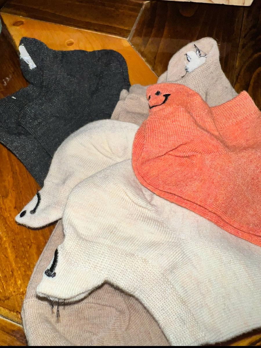 Socks with cute faces on the back picture