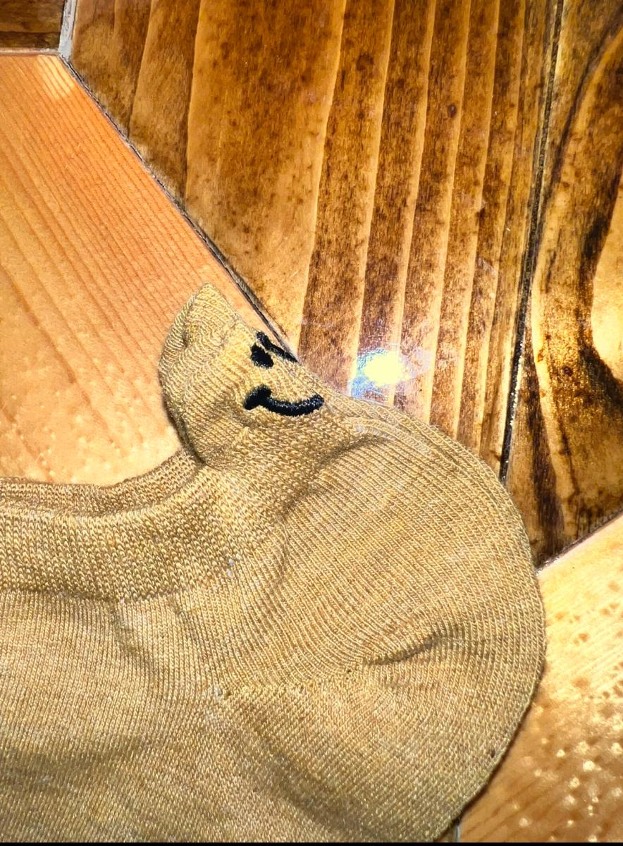 Socks with cute faces on the back picture