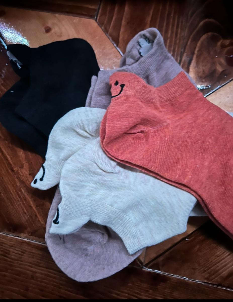 Socks with cute faces on the back picture