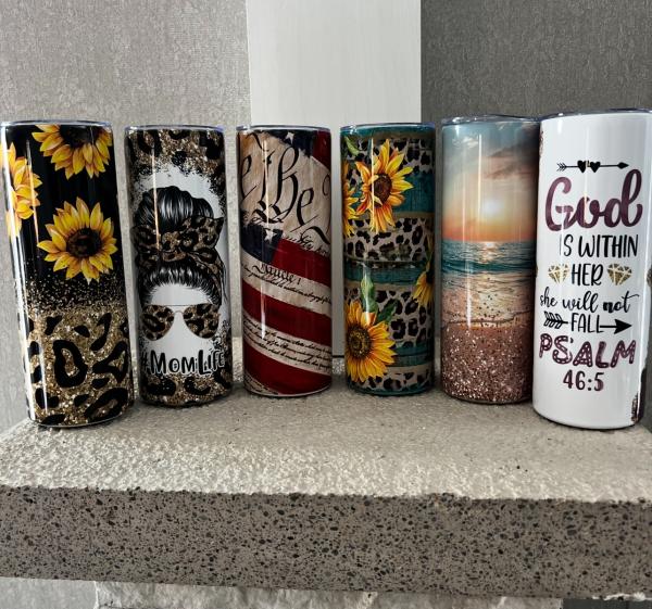 Customized 20 oz sublimation tumbler, vinyl designs and engraved cups