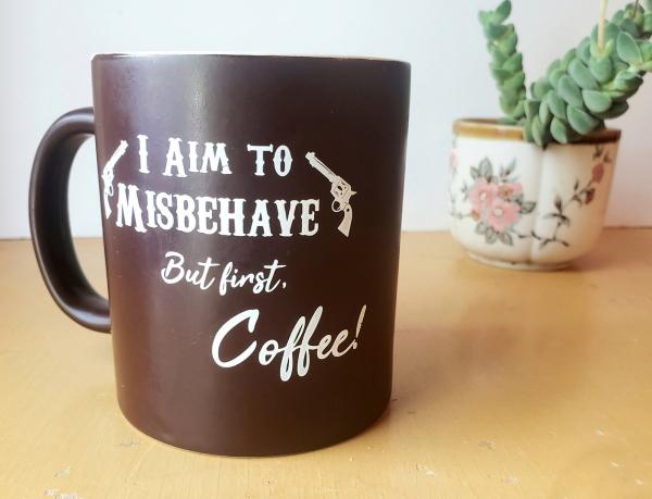Aim To Misbehave Coffee Cup