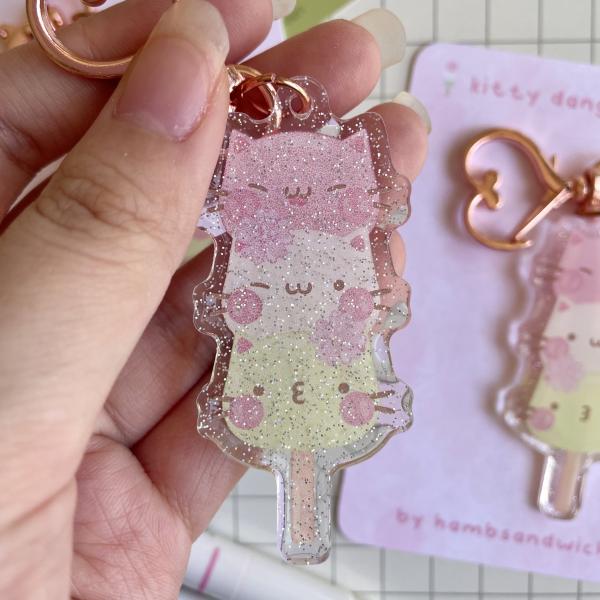 Kitty Dango Glitter Acrylic Keychain picture