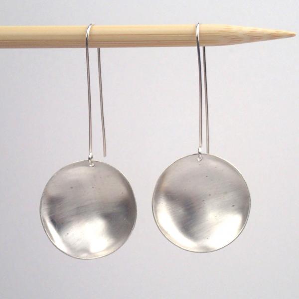 Large silver saucer earrings