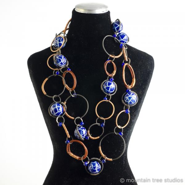 Copper-wrapped steel necklace with blue ceramic beads picture