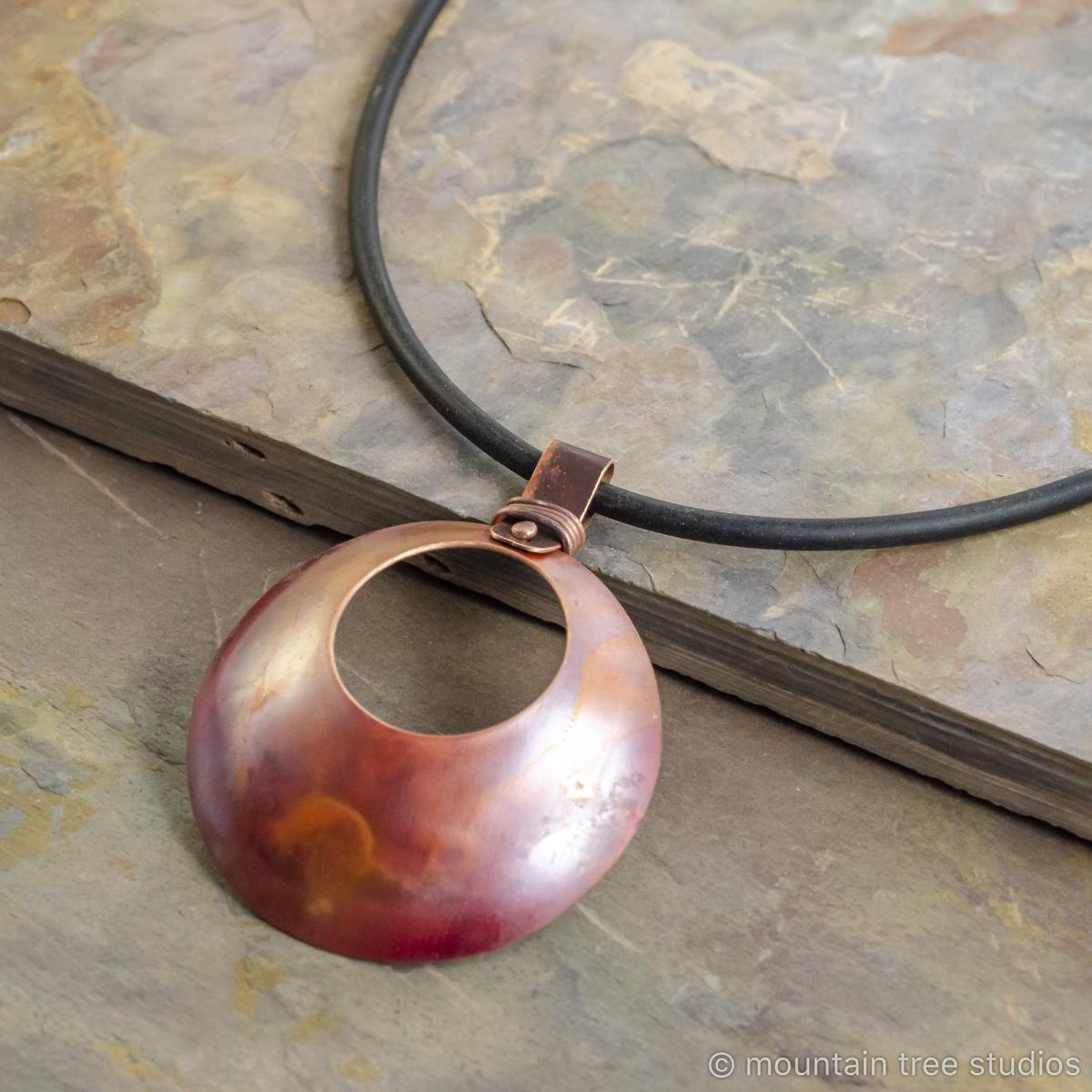 Copper dome with cutout necklace picture