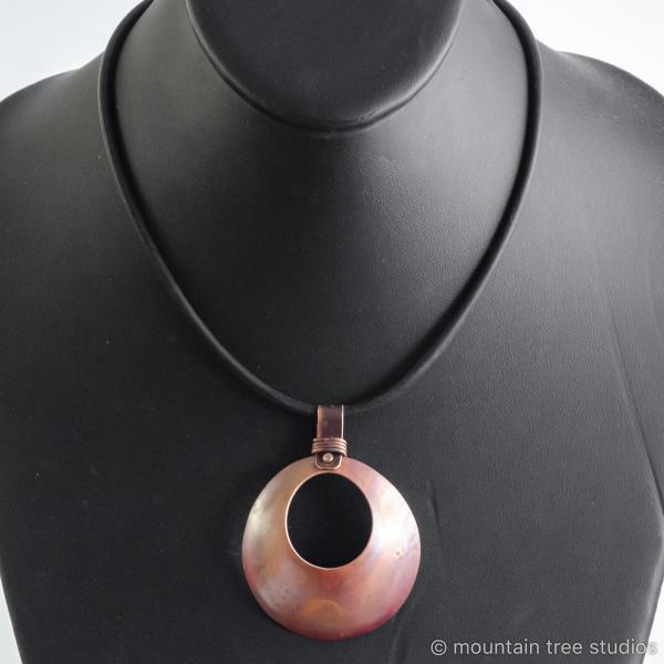 Copper dome with cutout necklace picture