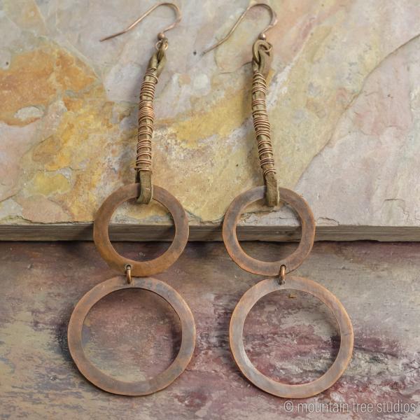 Long wrapped leather and circles earrings picture