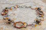 Wire-wrapped steel, leather and tigers-eye necklace