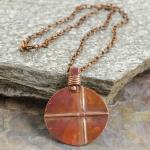 Criss cross disc necklace