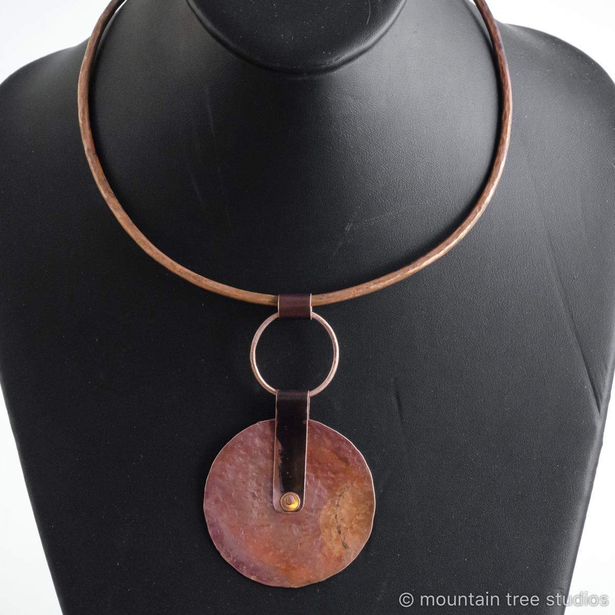 Large rustic disc pendant on torque necklace picture