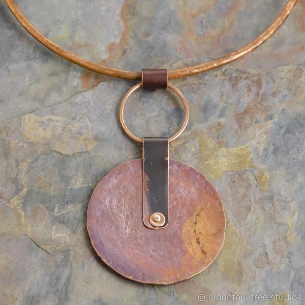 Large rustic disc pendant on torque necklace picture