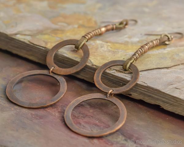 Long wrapped leather and circles earrings picture