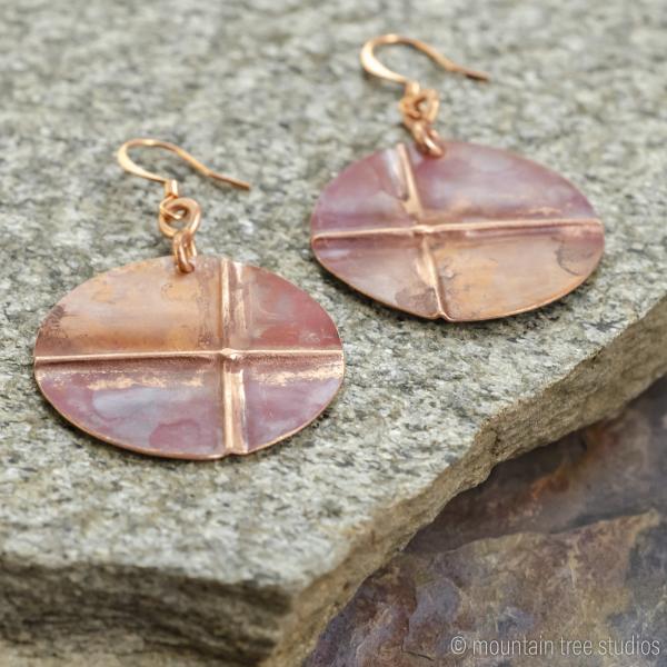 Criss cross disc earrings picture