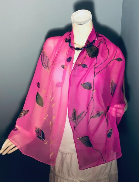 Hand Painted leaves embellished with gold resist on georgette scarf with pink background