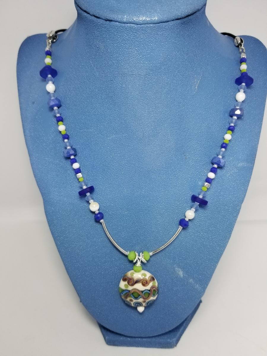 Blue Flowers in Ivory field Round pendant picture