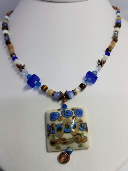 Blue Flowers in Ivory field pendant picture
