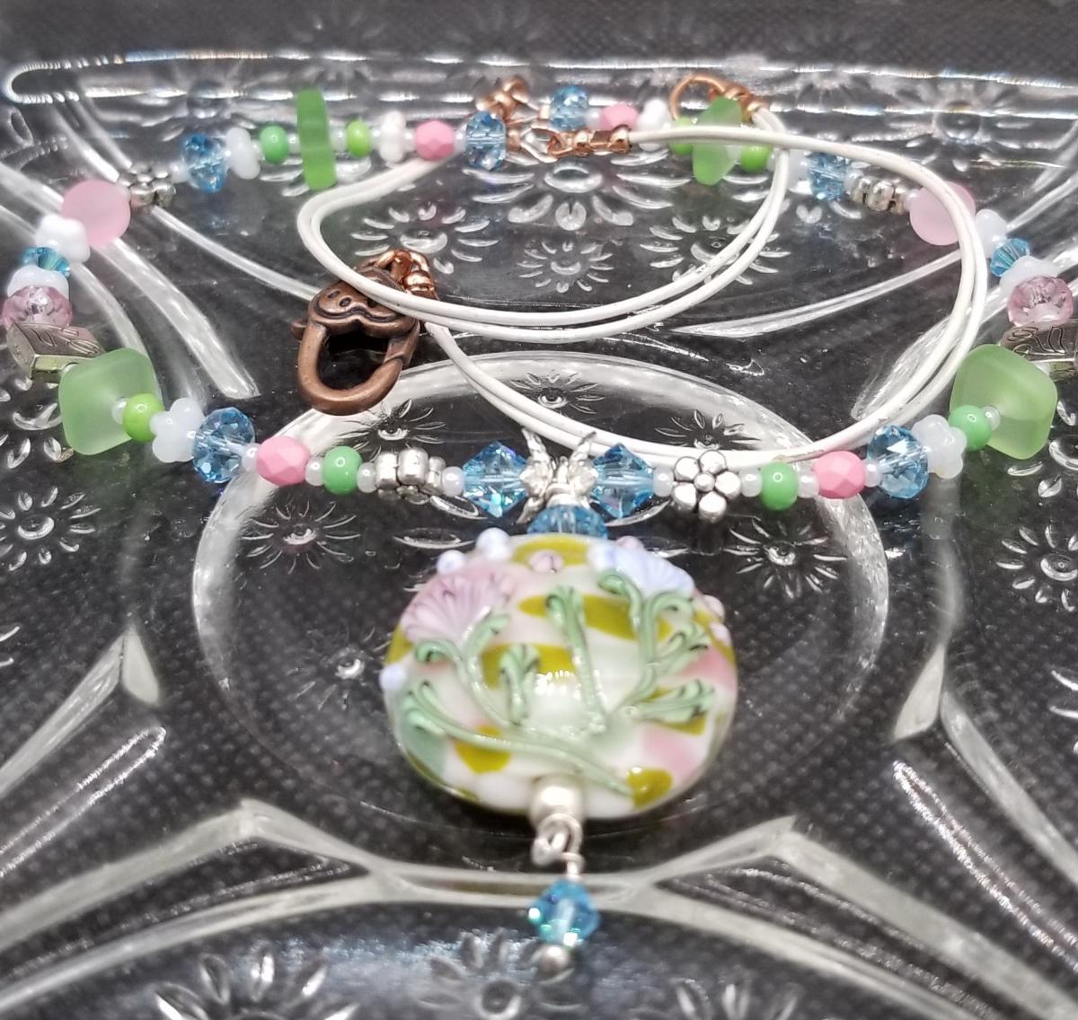 Spring Flowers in Ivory field round pendant picture