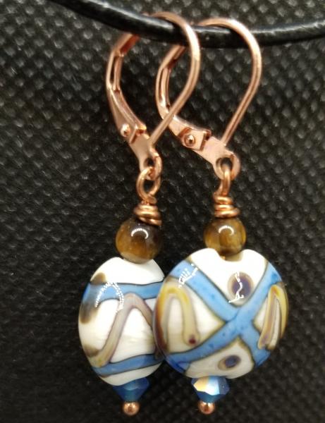 Blue and ivory colored earrings picture