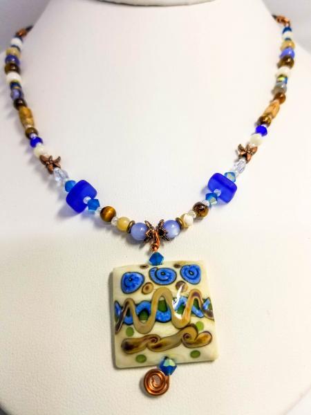 Blue flowers in Ivory field Square pendant