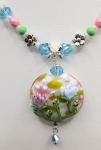 Spring Flowers in Ivory field round pendant