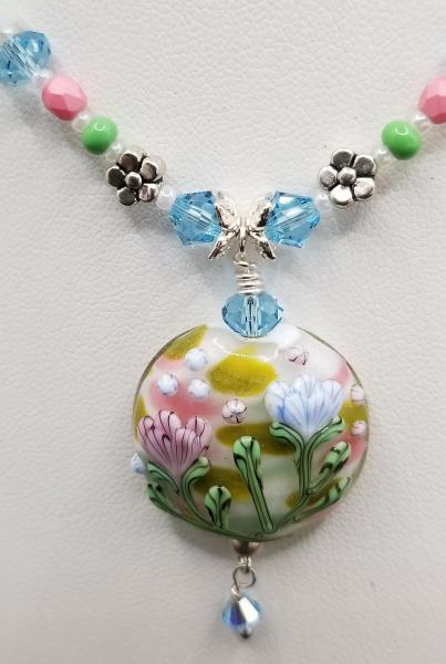 Spring Flowers in Ivory field round pendant picture