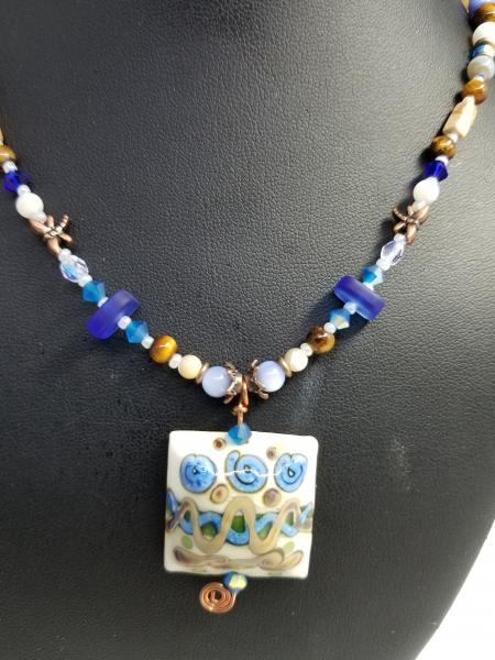 Blue Flowers in Ivory field pendant picture