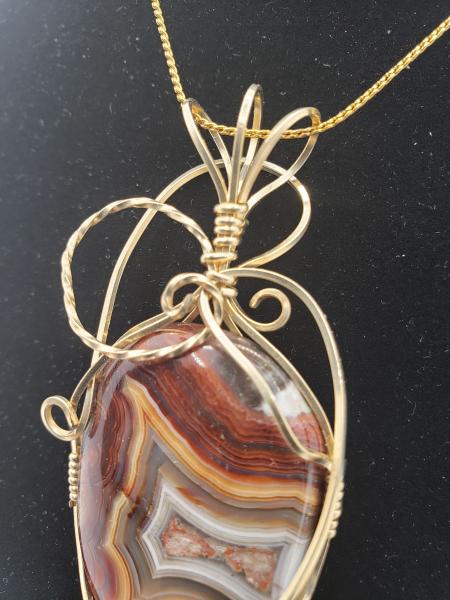 Crazy Lace Agate Pendant in Gold wire picture