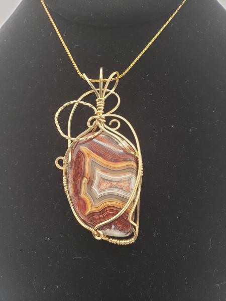 Crazy Lace Agate Pendant in Gold wire picture