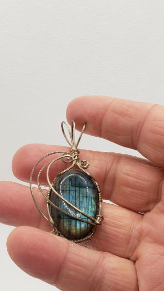 Adamite cabochon pendent wrapped in  Argentium  silver wire.