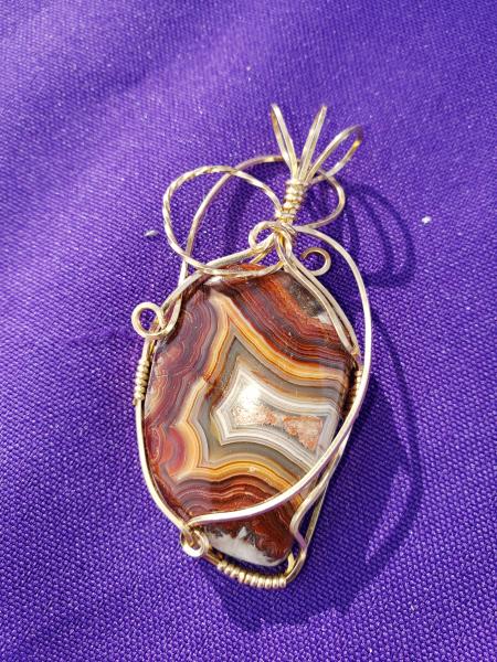 Crazy Lace Agate Pendant in Gold wire picture