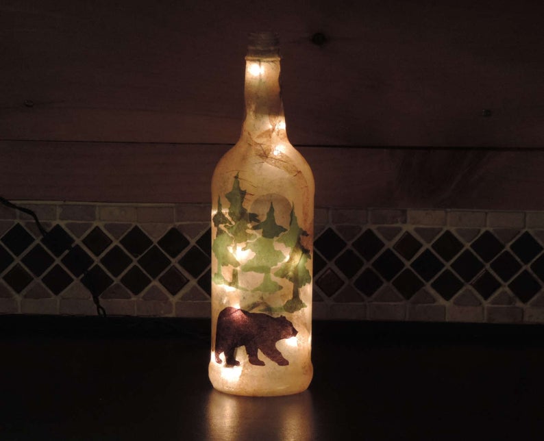 Black bear and pine trees picture